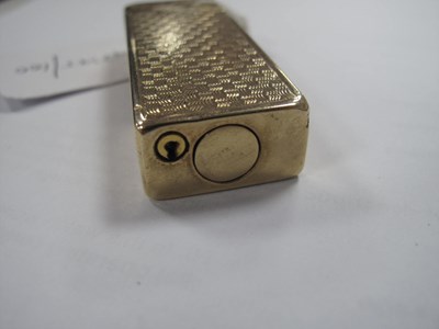 Lot 142 - Dunhill; A 9ct Gold Cigarette Lighter, allover...