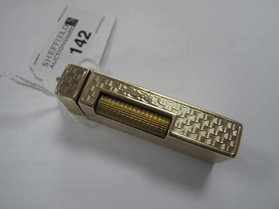 Lot 142 - Dunhill; A 9ct Gold Cigarette Lighter, allover...