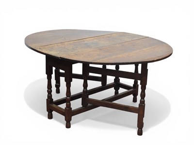 Lot 1591 - A XVII Century Joined Oak Gateleg Table, with...