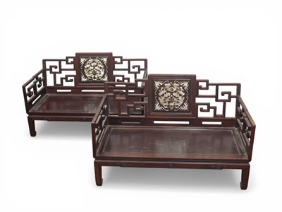 Lot 1556 - Two Chinese Hardwood Settees, central panel...