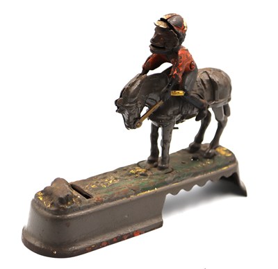 Lot 1301 - A Painted Cast Iron Money Box, cast as a...