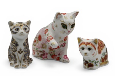 Lot 1095 - Three Royal Crown Derby Porcelain Paperweight,...