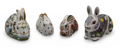 Lot 1107 - Four Royal Crown Derby Porcelain Paperweights...