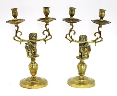 Lot 1304 - A Pair of Brass Twin-Branch Candlesticks, each...
