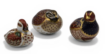 Lot 1103 - Three Royal Crown Derby Porcelain Paperweights,...