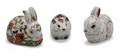 Lot 1106 - Three Royal Crown Derby Porcelain Paperweights,...