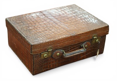 Lot 1330 - A Vintage Crocodile Dressing Case, with brass...