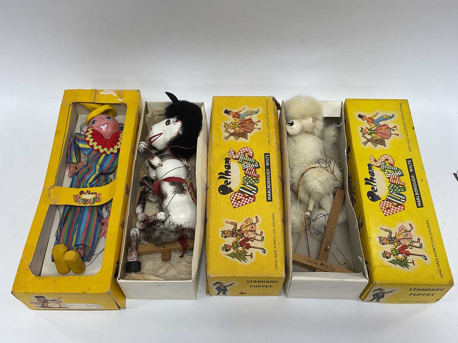 Lot 304 - Three Pelham Puppets, comprising of Poodle,...