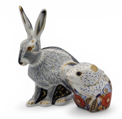 Lot 1096 - Two Royal Crown Derby Porcelain Paperweights...