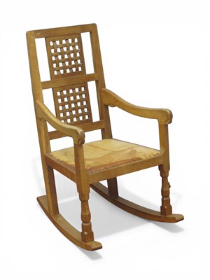 Lot 1581 - A Robert Thompson 'Mouseman' Oak Rocking Chair,...