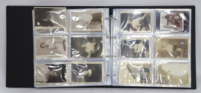 Lot 1389 - An Album of Early XX Century Picture Postcards...