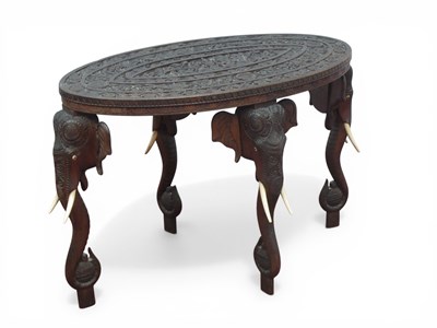 Lot 1560 - A XX Century Anglo-Indian Carved Hardwood...