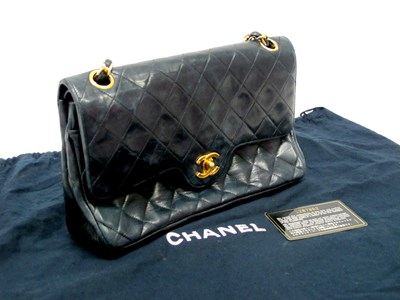 Lot 1430 - CHANEL; A Medium Classic Double Flap Handbag,...