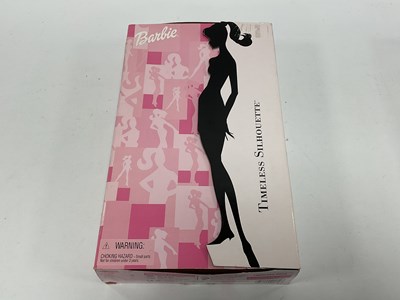 Lot 311 - Five Modern Mattel Barbie Dolls, comprising of...
