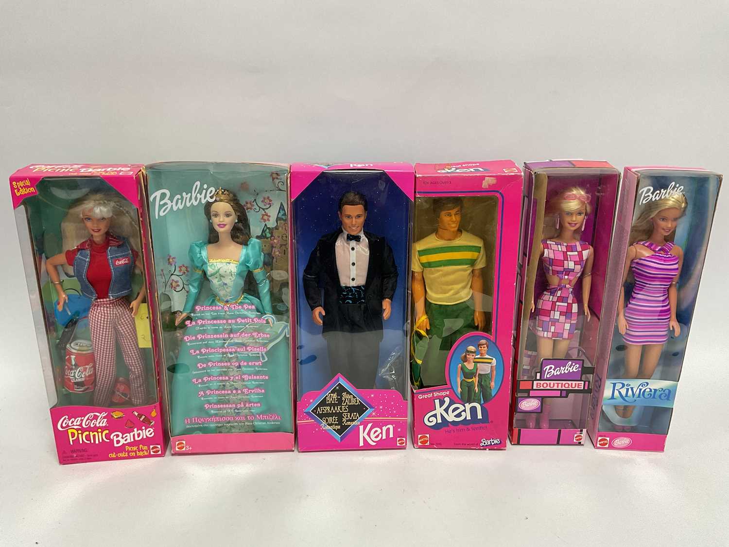 Lot 324 - Six Modern Mattel Barbie and Ken Dolls,...