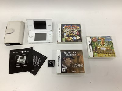 Lot 634 - A Nintendo DS Lite handheld games console...