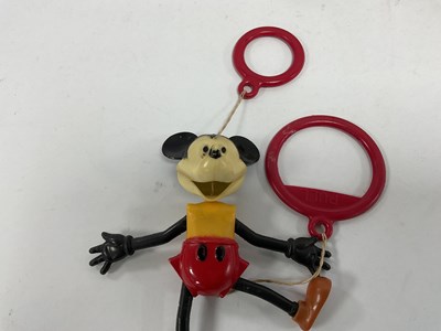 Lot 303 - Six Plastic and Tinplate toys made in Hong...