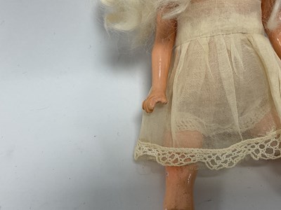 Lot 312 - A Small Bisque Headed German doll, with blue...
