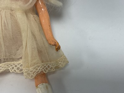 Lot 312 - A Small Bisque Headed German doll, with blue...