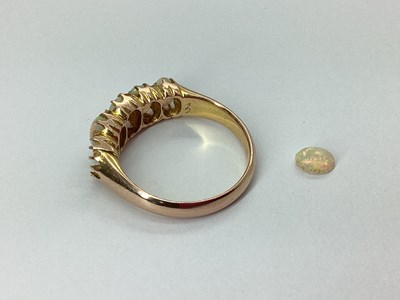 Lot 92 - A Five Stone Opal Ring, graduated claw set...