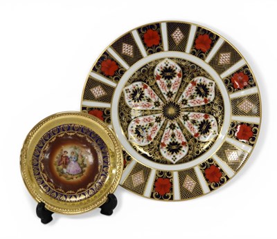 Lot 1056 - A Royal Crown Derby Porcelain Plate, decorated...