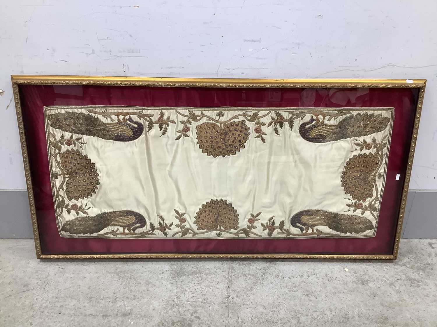 Lot 1018 - An Indian Zardozi embroidery panel, featuring...
