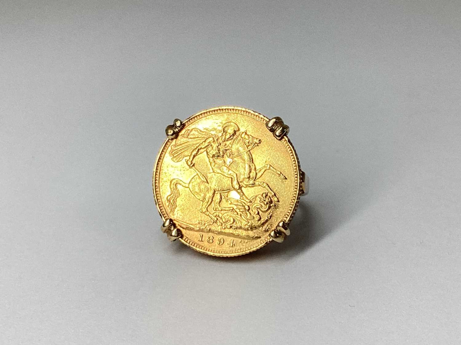 Lot 81 - Victoria Sovereign, 1894 (S), claw set within...