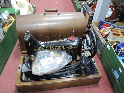 Lot 1027 - A c1922 wooden cased Singer No.99 electric...