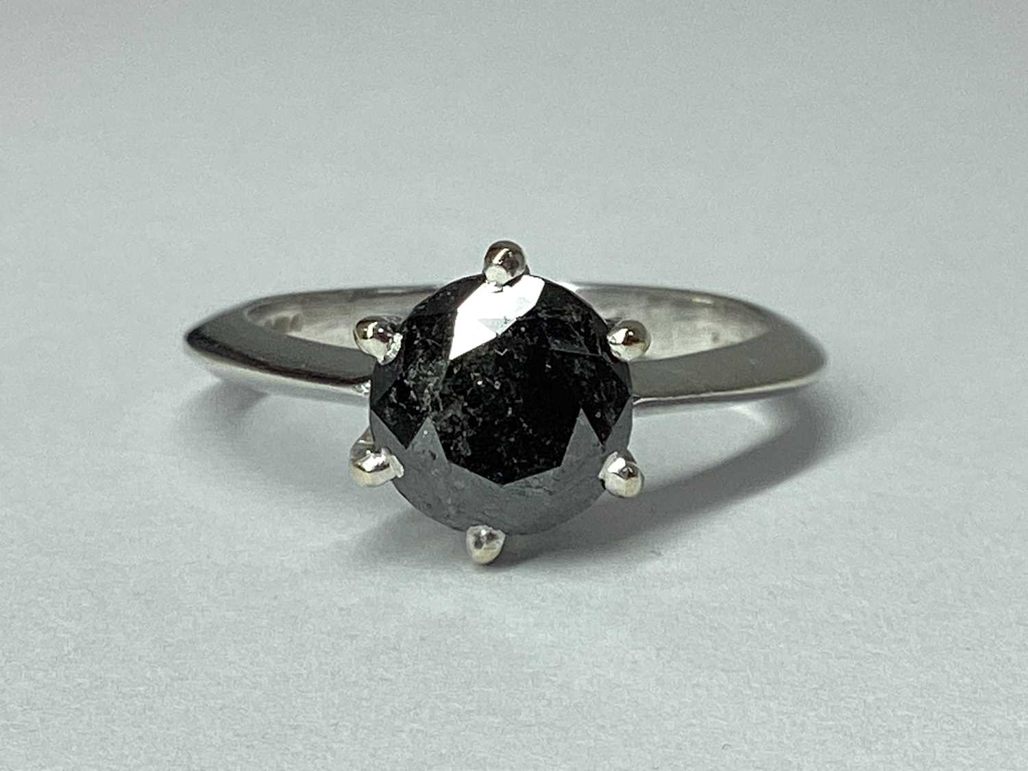 Lot 85 - A Modern 9ct White Gold Black Diamond Single...