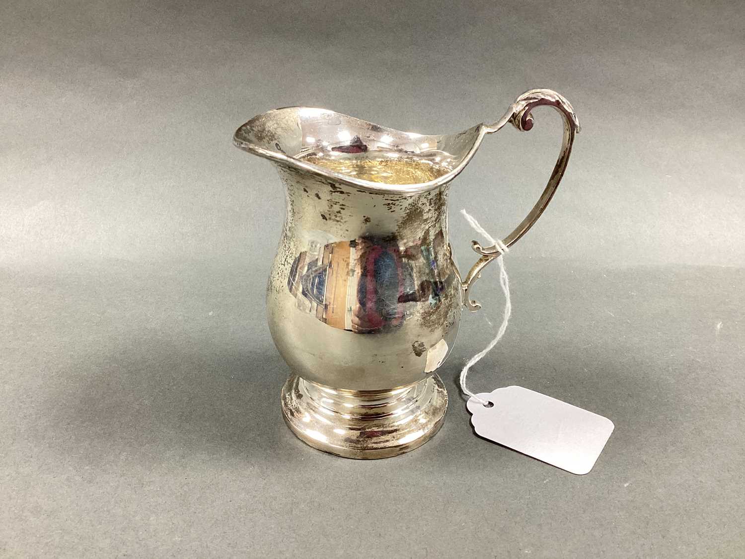 Lot 19 - A Hallmarked Silver Jug, HH, Sheffield 1968,...