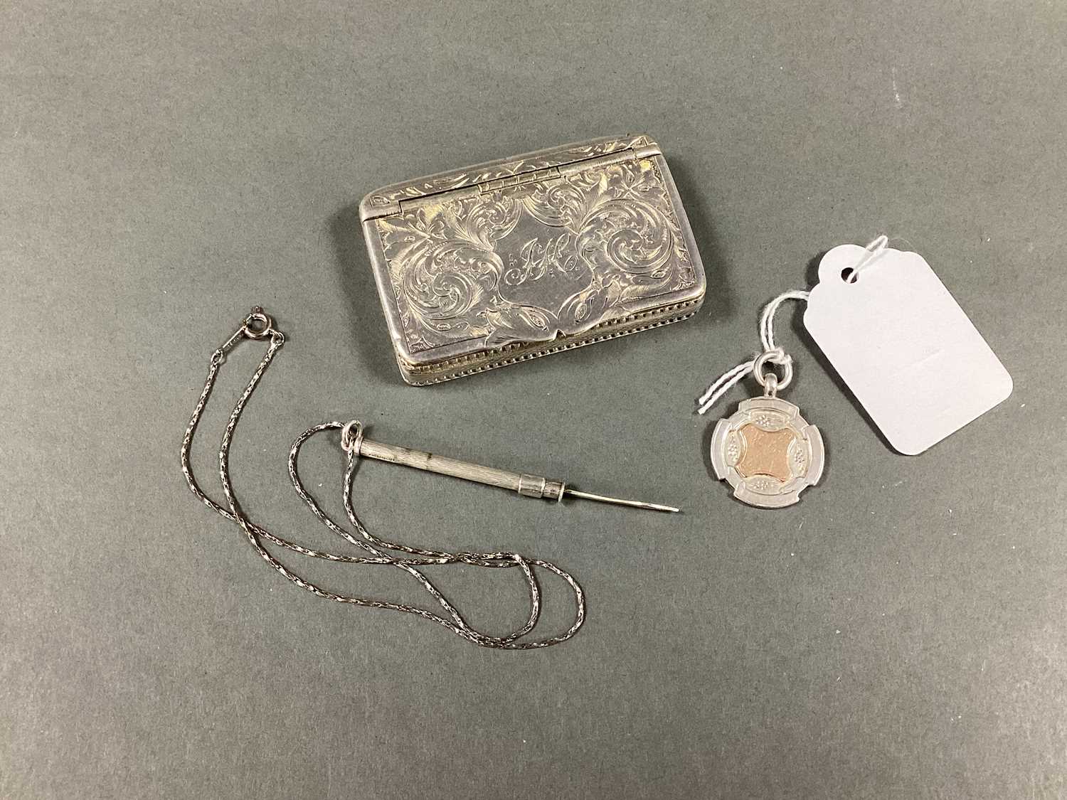 Lot 63 - A Hallmarked Silver Sliding Tooth Pick, on a...