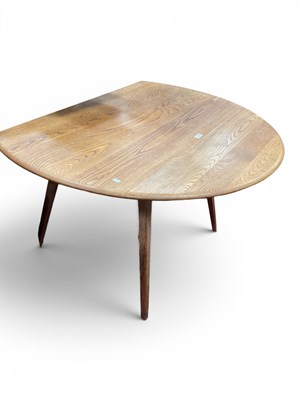 Lot 1566 - Ercol Light Wood Drop Leaf Dining Table, with...
