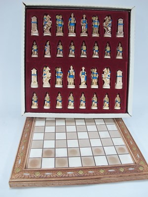 Lot 1423 - A boxed Greek Roman themed chess set, by...