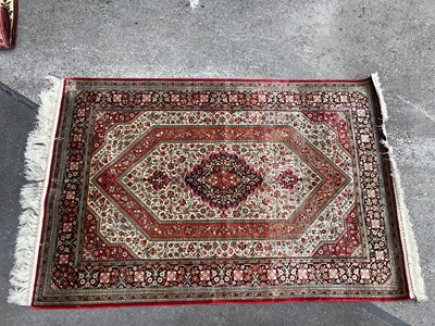 Lot 1472 - A Silk Persian Ghom Rug, decorated with floral...