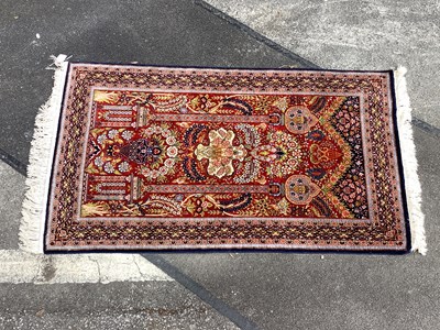 Lot 1475 - A Handmade Silk Kashan Rug decorated with a...