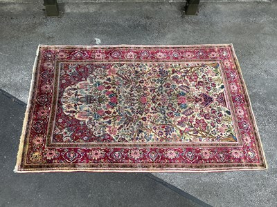 Lot 1479 - A Silk Kashan Rug decorated with a central...
