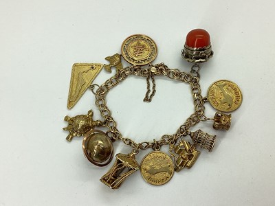Lot 86 - A Fancy Link Charm Bracelet, to snap clasp...