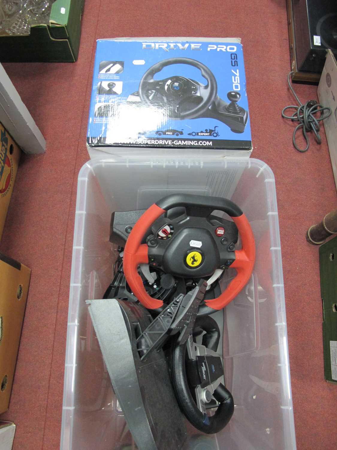 Lot 1060 - Gaming racing steering wheels with pedalboard:...