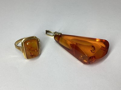 Lot 69 - A Modern Amber Coloured Ring, rectangular...
