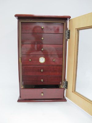 Lot 1415 - A wooden cigar humidor with mahogany style...