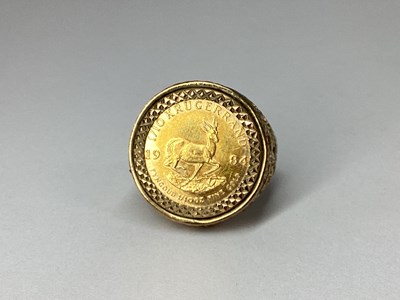 Lot 66 - A 1/10 Krugerrand Ring, 1982, loose set(?),...