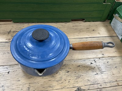 Lot 1026 - Cast iron enamelled kitchenware, including...