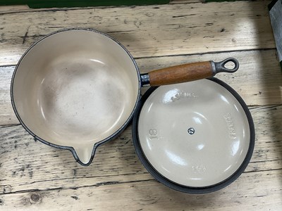 Lot 1026 - Cast iron enamelled kitchenware, including...