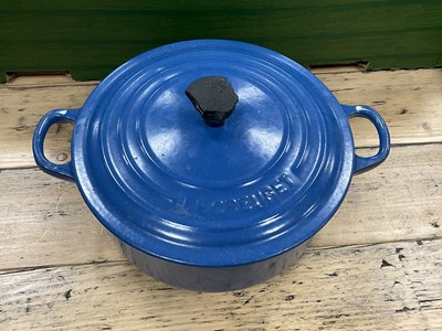Lot 1026 - Cast iron enamelled kitchenware, including...