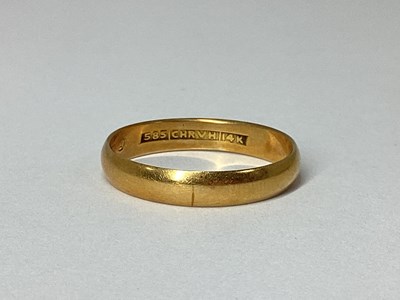 Lot 72 - A Plain Wedding Band, stamped "585 CHR.V.H.14K"...