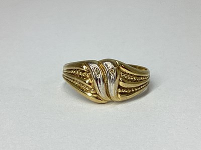 Lot 81 - A Fancy Two Colour Dress Ring, of textured...