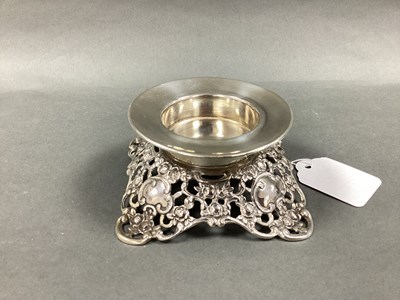 Lot 9 - A Decorative Stand / Candle Holder, on scroll...