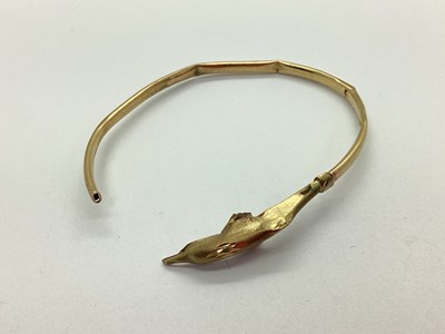 Lot 112 - A Dolphin Bangle, (damages / incomplete).