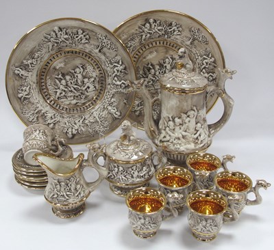 Lot 1181 - Italian Capodimonte cherub motif lustre coffee...