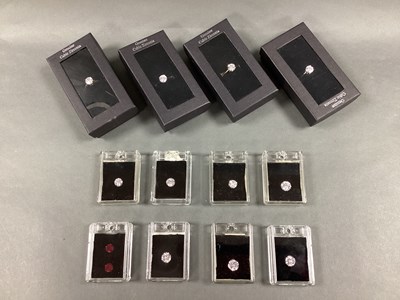 Lot 146 - Four Modern Single Stone CZ Claw Set Rings,...